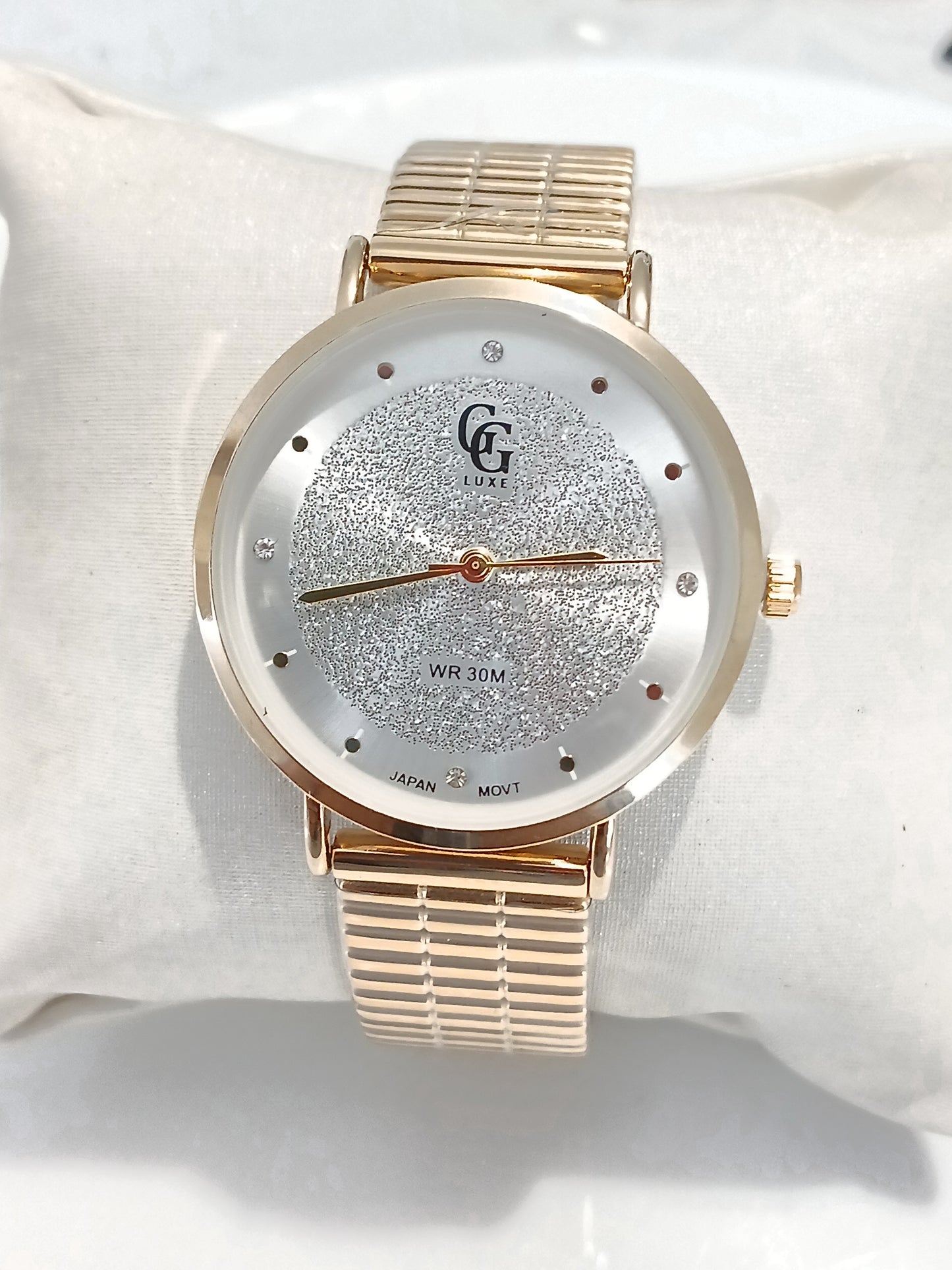 Montre fond pailletté